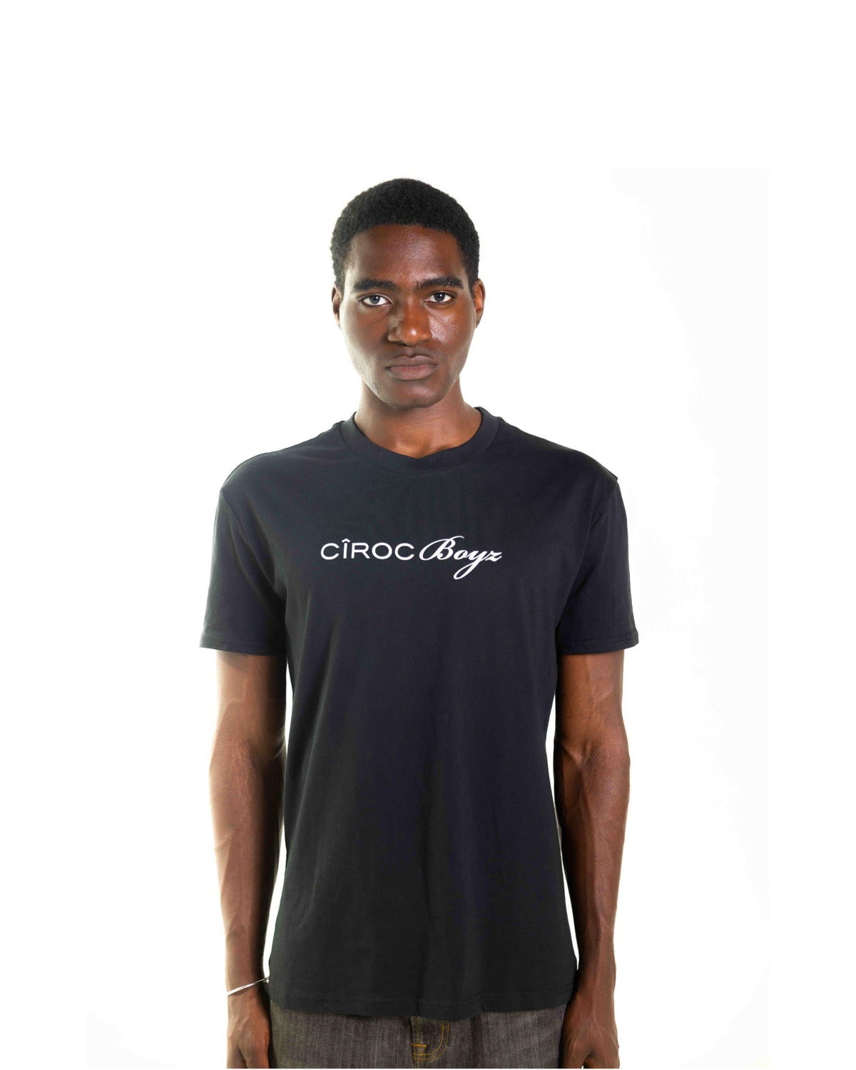 A man wearing a black short-sleeve crewneck t-shirt with 'CIROC Boys' printed in white script across the chest, set against a plain white background.
